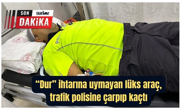 “Dur” ihtarına uymayan lüks araç, trafik polisine çarpıp kaçtı